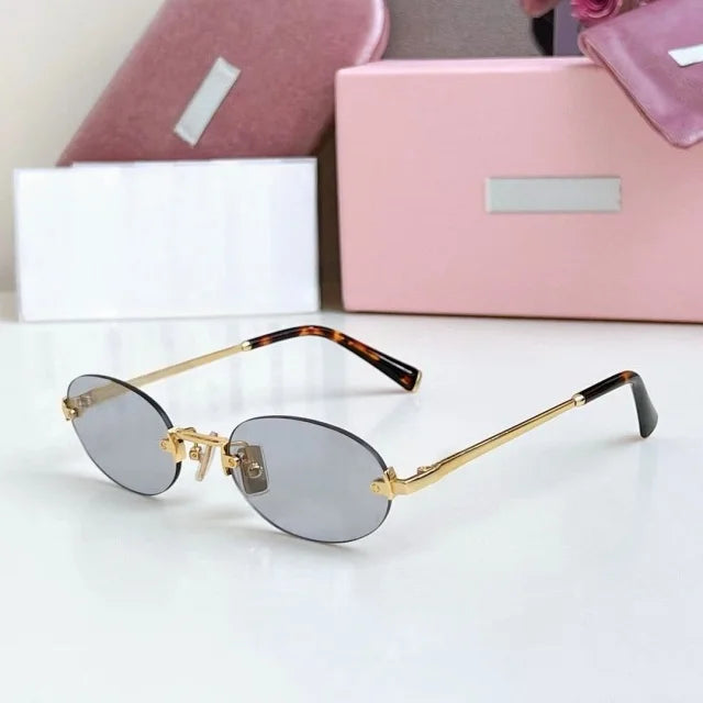 Women Fashion Rimless Oval Sunglasses Brand Desinger Retro Popular Eyeware Girls Travel Party Shades Frameless Sun Glasses UV400