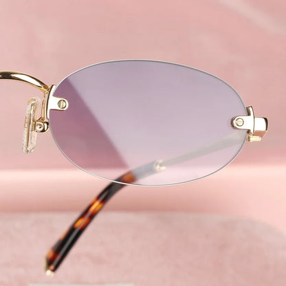 Women Fashion Rimless Oval Sunglasses Brand Desinger Retro Popular Eyeware Girls Travel Party Shades Frameless Sun Glasses UV400