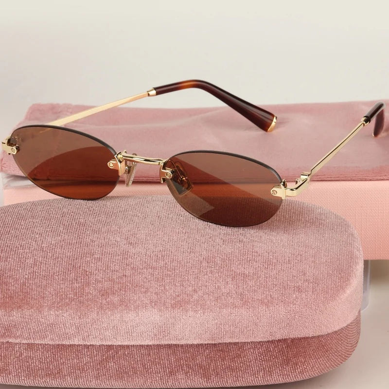 Women Fashion Rimless Oval Sunglasses Brand Desinger Retro Popular Eyeware Girls Travel Party Shades Frameless Sun Glasses UV400