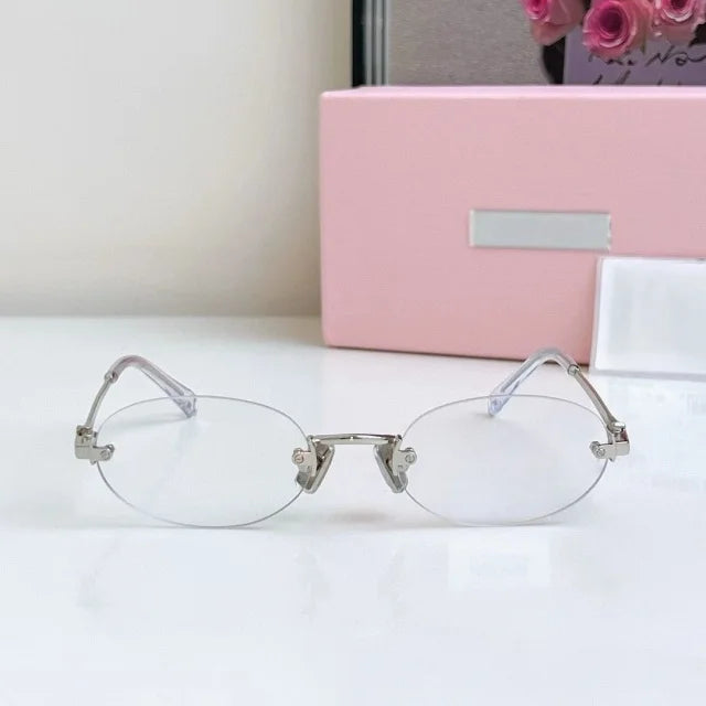 Women Fashion Rimless Oval Sunglasses Brand Desinger Retro Popular Eyeware Girls Travel Party Shades Frameless Sun Glasses UV400