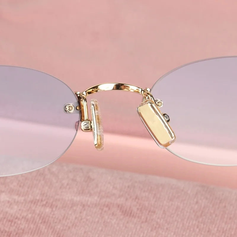 Women Fashion Rimless Oval Sunglasses Brand Desinger Retro Popular Eyeware Girls Travel Party Shades Frameless Sun Glasses UV400